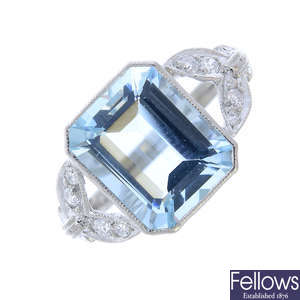An aquamarine and diamond ring.