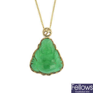 A 14ct gold jade pendant, with 9ct gold chain.