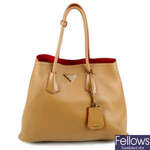 PRADA - a caramel leather handbag.