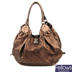 LOUIS VUITTON - a metallic bronze leather Mahina hobo handbag.