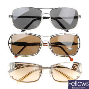 Three pairs of designer sunglasses.