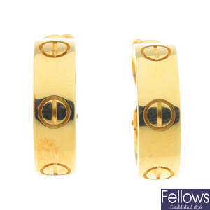 CARTIER - a pair of 18ct gold 'Love' earrings.