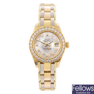 ROLEX - a lady's 18ct yellow gold Oyster Perpetual Datejust Pearlmaster bracelet watch.