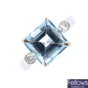 A 14ct gold aquamarine and diamond dress ring.