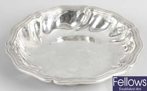 A continental white metal bowl.
