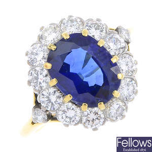 GARRARD & CO. - an 18ct gold sapphire and diamond cluster ring.