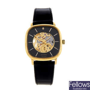 BUCHERER - a gentleman's gold plated wrist watch.