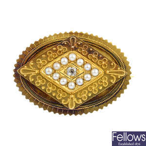 A late Victorian gold diamond and split pearl brooch.
