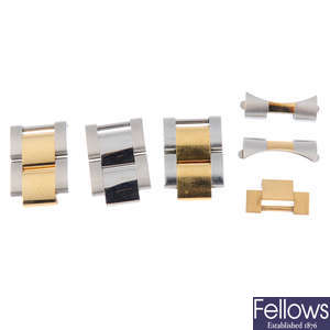 ROLEX - a group of assorted yellow metal, bi-metal and stainless steel bracelet links.