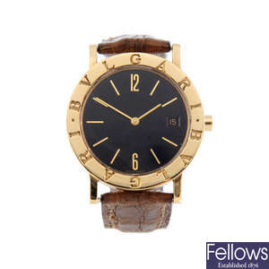 BULGARI - a mid-size 18ct yellow gold Bulgari wrist watch.