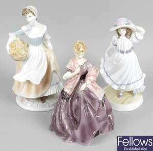 A group of twenty Royal Worcester figurines.