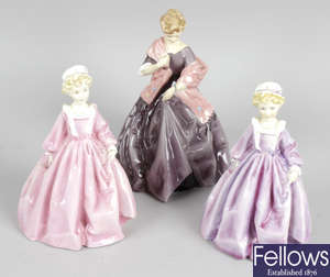 A group of seven Royal Worcester figurines.