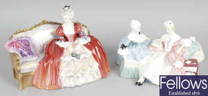 A group of thirteen Royal Doulton figurines.