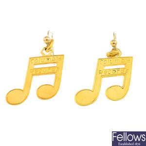 A pair of musical note earrings.