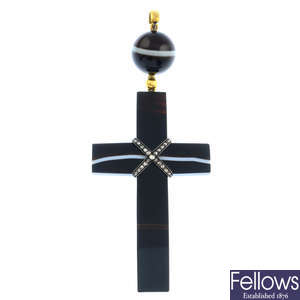 A banded agate and diamond cross pendant.