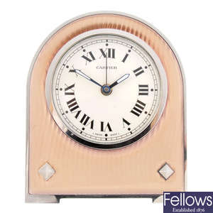 A bi-material desk alarm clock by Cartier.