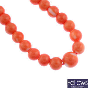 A coral bead single-strand necklace.