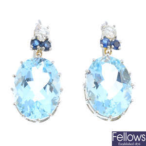 A pair of diamond, aquamarine and sapphire earrings.
