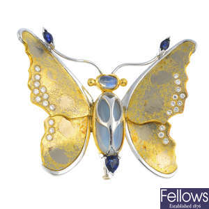 An 18ct gold moonstone, diamond and sapphire butterfly brooch.