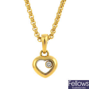 CHOPARD - an 18ct gold 'Happy Diamonds' pendant, with 18ct gold chain.