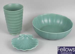 A Wedgwood Keith Murray green glazed vase, together with a similar bowl and a Wedgwood matt green glazed shell shaped dish.