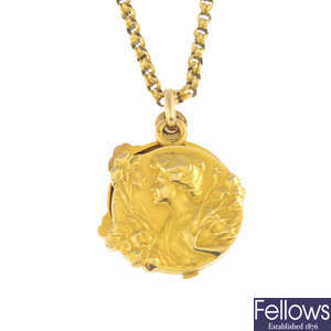 An Art Nouveau gold locket, with gold chain.