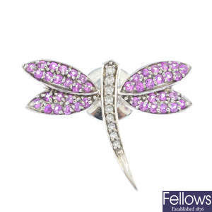 A sapphire and diamond dragonfly brooch.