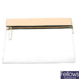 VICTORIA BECKHAM - a two-tone leather clutch.
