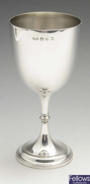 A late Victorian plain silver goblet. 