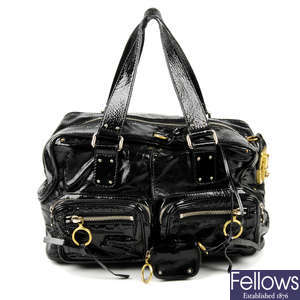 CHLOÉ - a black patent leather Betty handbag.