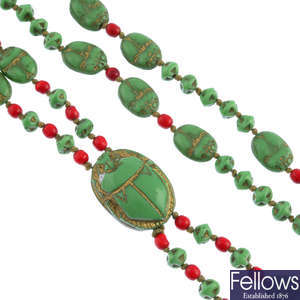 NEIGER BROTHERS - a 1920s Egyptian Revival glass scarab bead necklace.