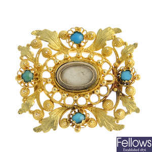An early 19th century gold turquoise brooch.