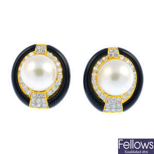 A pair of cultured pearl, diamond and onyx earrings.
