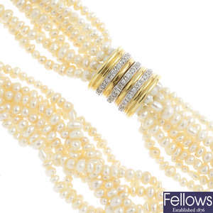 A cultured freshwater pearl multi-strand choker necklace.