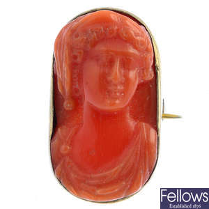 A 19th century coral cameo brooch.