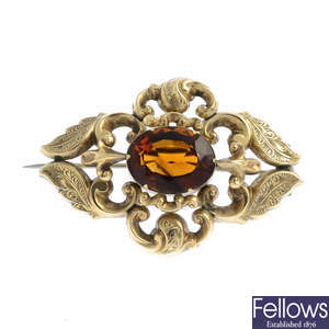 A late Victorian gold citrine brooch.