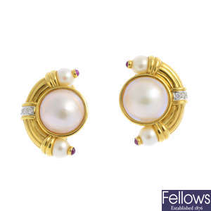 A pair of mabe pearl, cultured pearl, diamond and ruby earrings.
