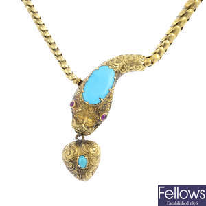 A mid Victorian gold, turquoise and ruby snake necklace.