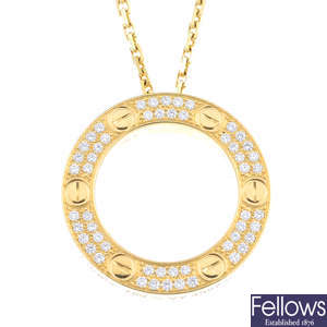 CARTIER - an 18ct gold diamond 'Love' pendant, on chain.