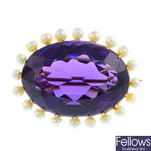 An early 20th century gold amethyst and seed pearl brooch.