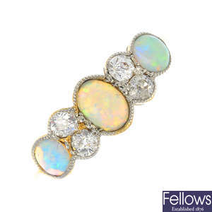An early 20th century 18ct gold and platinum opal and diamond ring.