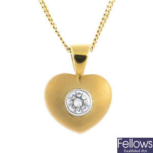 An 18ct gold diamond pendant, with an 18ct gold chain.
