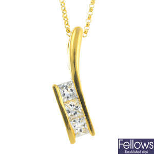 An 18ct gold diamond three-stone pendant, with chain.
