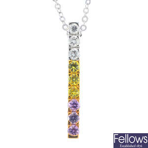 An 18ct gold diamond and sapphire pendant, with chain.