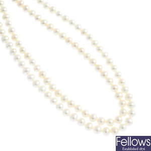 A quantity of cultured pearl strands and loose beads.