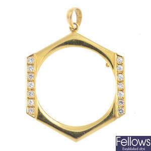 A gold and diamond pendant mount.