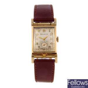 BULOVA - a mid-size gold plated wrist watch.