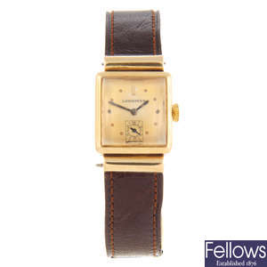 LONGINES - a lady's yellow metal wrist watch with a Longines wrist watch.