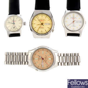 A group of four assorted West End Watch Co. watches.