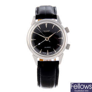 TISSOT - a gentleman's stainless steel Alarm wrist watch and another Tissot watch.